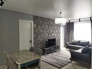 Продаётся просторная светлая квартира: большая гостиная, две спальни, гардеробная, балкон. Batumi
