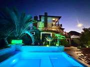 Апартаменты с теплым бассейном в центре Сириуса Сочи