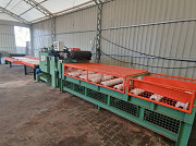 Многопильная линия для раскроя с центрирующим столом и выгрузкой досок Тбилиси