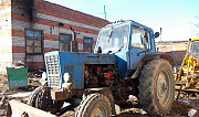 Трактор с прицепом Вологда
