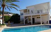 Продается вилла 230 кв метров с бассейном и частным садом в Л’Альбире Alicante