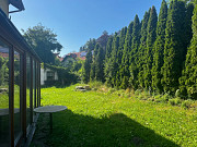 Дом на две семьи с красивым садом Мюнхен